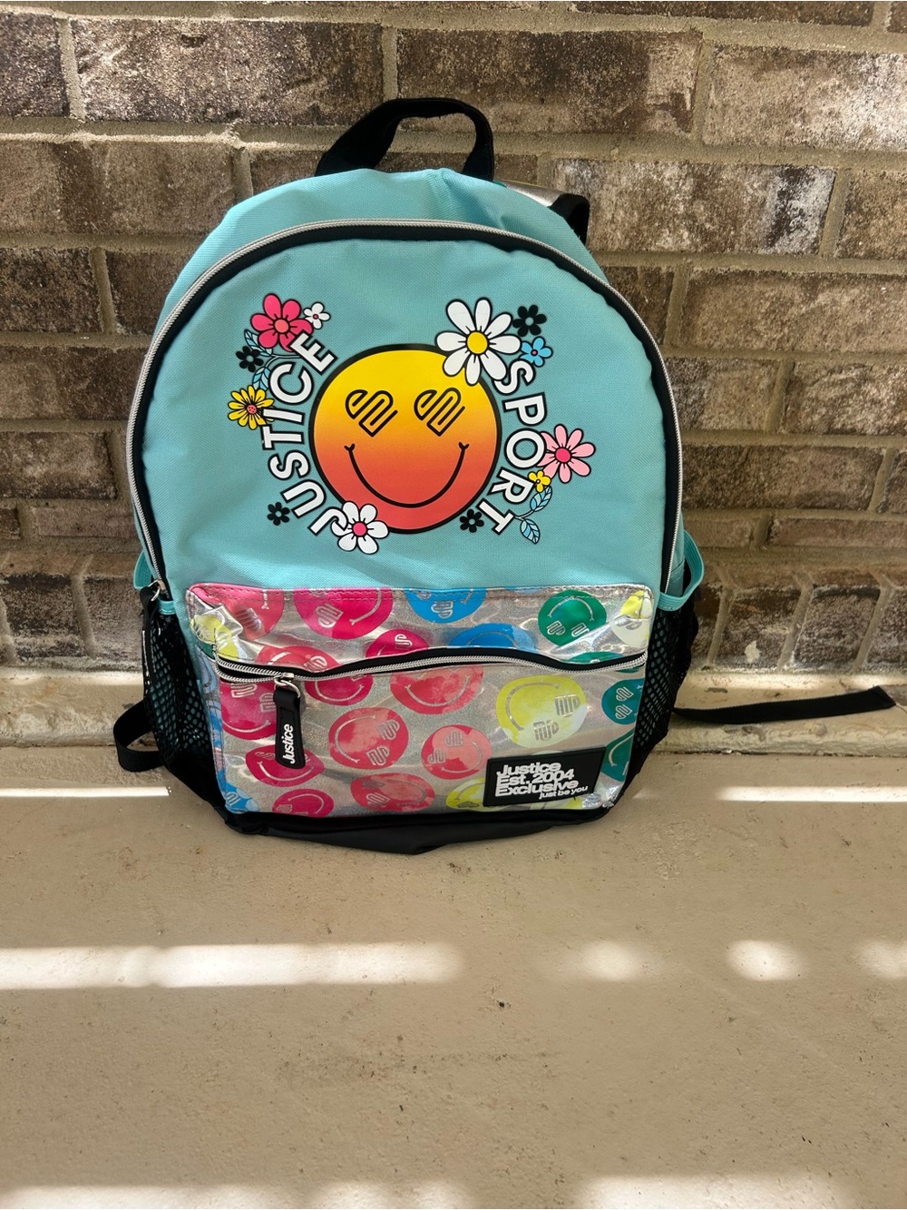 Justice Sport Smiley Face Daisy Backpack Turquoise Holographic School Bag